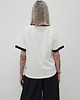 t-shirt damskie Bawełniany kremowy t-shirt o swobodnym kroju z kontrastową lamówką 4