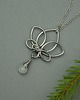 wisiory Wisiorek kwiat lotosu kamień księżycowy wire wrapping 1