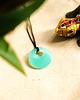 wisiory Turkusowy okrągły wisiorek świecący w ciemności i UV handmade 2,5 cm 2