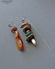kolczyki wire wrapping Autorskie designerskie zakręcone niezwykłe kolczyki handmade bursztyn 1