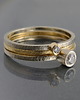 pierścionki zaręczynowe Komplet złotych pierścionków z brylantami 1