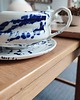 kubki i filiżanki Porcelanowa filiżanka w niebieskie kropki ze spodkiem 5