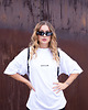 t-shirt damskie Biała koszulka oversized z napisem CLASSY AS FUCK 6