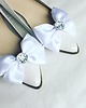 dodatki ślubne klipsy do butów białe satynowe duże kokardy 1
