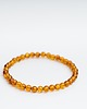 bransoletki z kamieni naturalnych Bransoletka bursztyn koniakowy kulka regularna 8
