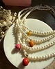 chokery Choker z pereł naturalnych z zawieszką owocem 1