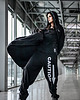 spodnie męskie Czarne wygodne spodnie unisex CAUTION! 1