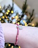 bransoletki z kamieni naturalnych Różowy rodonit na gumce - bransoletka z zawieszką 1