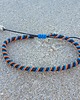 biżuteria męska Męska Bransoletka sznurkowa - snake spiralna - czarno pomarańczowo niebieska . 1