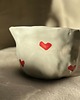 kubki Filiżanka ceramiczna biała w serduszka 1