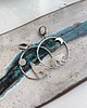 kolczyki wire wrapping Srebrne kolczyki z wilkami 1