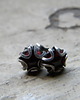 kolczyki wire wrapping granaty w roślinopodobnej oprawie 1