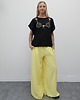 t-shirt damskie Bawełniany bezrękawnik z nadrukiem - Yellow bikini top 1
