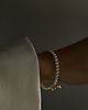 bransoletki złote Złota bransoletka z białych pereł SWAROVSKI CRYSTAL z kokardką 1