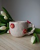 kubki Ceramiczny kubek z motywem kwiatów 1
