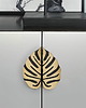 meble - gałki Uchwyt meblowy MONSTERA GOLD BLACK 2