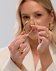 bransoletki - inne Złota sztywna bransoletka obręcz z motywem węzła Paraiso Nerivana 3