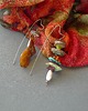 kolczyki wire wrapping Autorskie designerskie zakręcone niezwykłe kolczyki handmade bursztyn 3
