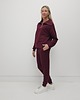 komplety damskie Anisa minimalistyczny lekko dopasowany komplet spodnie i bluza - Cherry 3