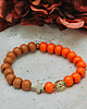 bransoletki drewniane Pomarańczowa bransoletka z krzyżykiem, różaniec na rękę, drewno 1