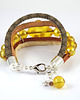 bransoletki - inne Bransoletka - Żółta - rzemienie, koraliki 1