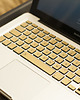 akcesoria różne Złote naklejki na Macbooka 1