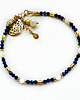bransoletki z kamieni naturalnych Bransoletka z lapis lazuli , granatowa bransoleta z perłą i rozetą 4