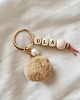 breloki Brelok z imieniem personalizowany brązowy pompon 1