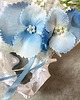 dodatki ślubne Delikatna podwiązka z błękitnymi kwiatami 1
