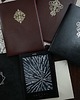 pokrowce i etui - różne Etui Pan Dyskretny na czytnik Kindle Basic 1