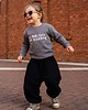 bluzy dla dziewczynki Bluza dziecięca W MIEJSCU NIE USIEDZĘ - szara 4