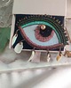 broszki Broszka oko z perłą i muszlami 3