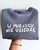bluzy dla dziewczynki Bluza dziecięca W MIEJSCU NIE USIEDZĘ - szara 1