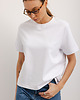 t-shirt damskie Biały bawełniany t-shirt pod szyje 1