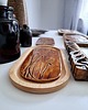 Ozdoby na ścianę Ceramiczna podstawka w drewnie 1