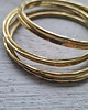 bransoletki złote Komplet czterech bransolet z mosiądzu 2