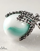 kolczyki wire wrapping Miętowe prążki w siateczce - kolczyki (lub klipsy) 1