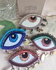 broszki Broszka oko z perłą i muszlami 4