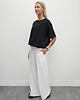 spodnie materiałowe damskie Tkaninowe spodnie boucle z zakładkami - Cream 1