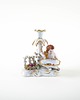 figurki i rzeźby Figuralny świecznik porcelanowy z puttem w stylu Art Deco 1